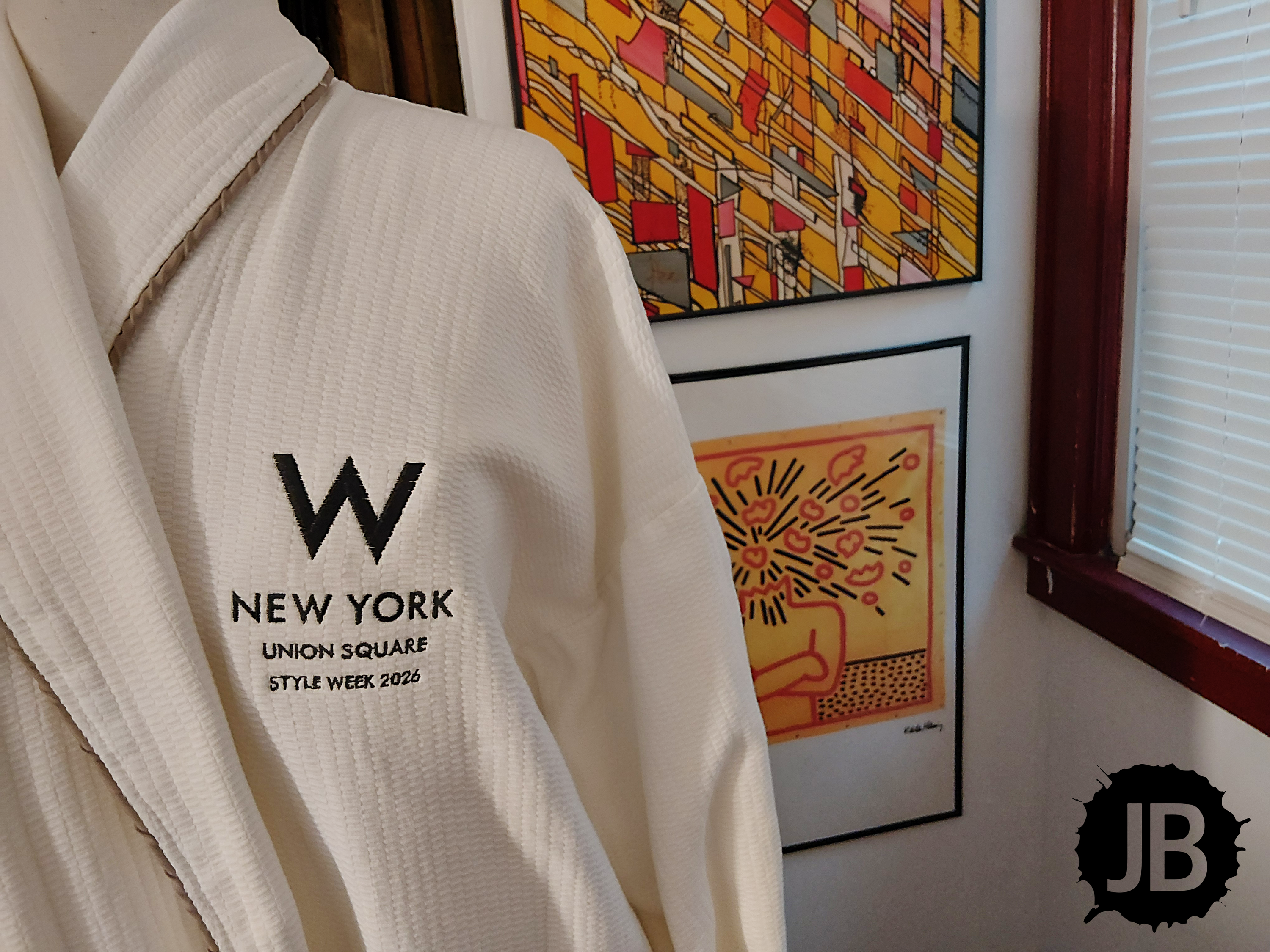 White waffle pattern robe embroidered with the W Hotel logo on the left chest