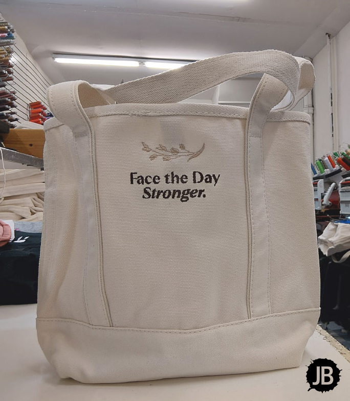 Custom embroidered tote bag with small logo embroidery by JB Screen Printing and Embroidery in New York City
